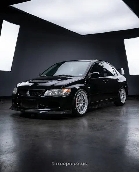 2005 Mitsubishi Lancer Evolution with Enkei NT03+M 5x114.3 18x8.5+38 Silver wheels