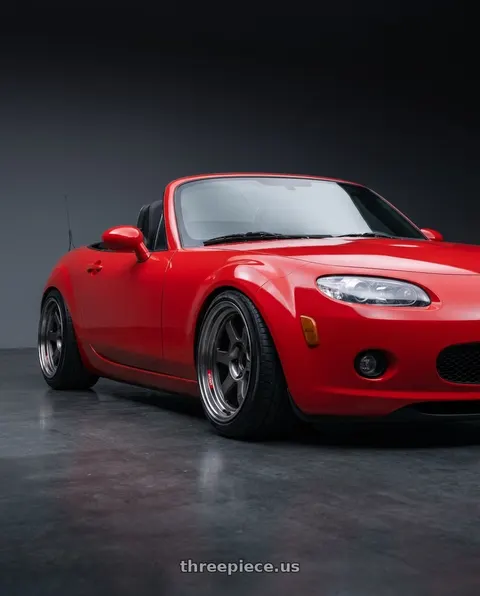 2007 Mazda MX-5 Miata with Volk Racing TE37V PRO 5x114.3 17x10.5+0 Pressed Graphite wheels