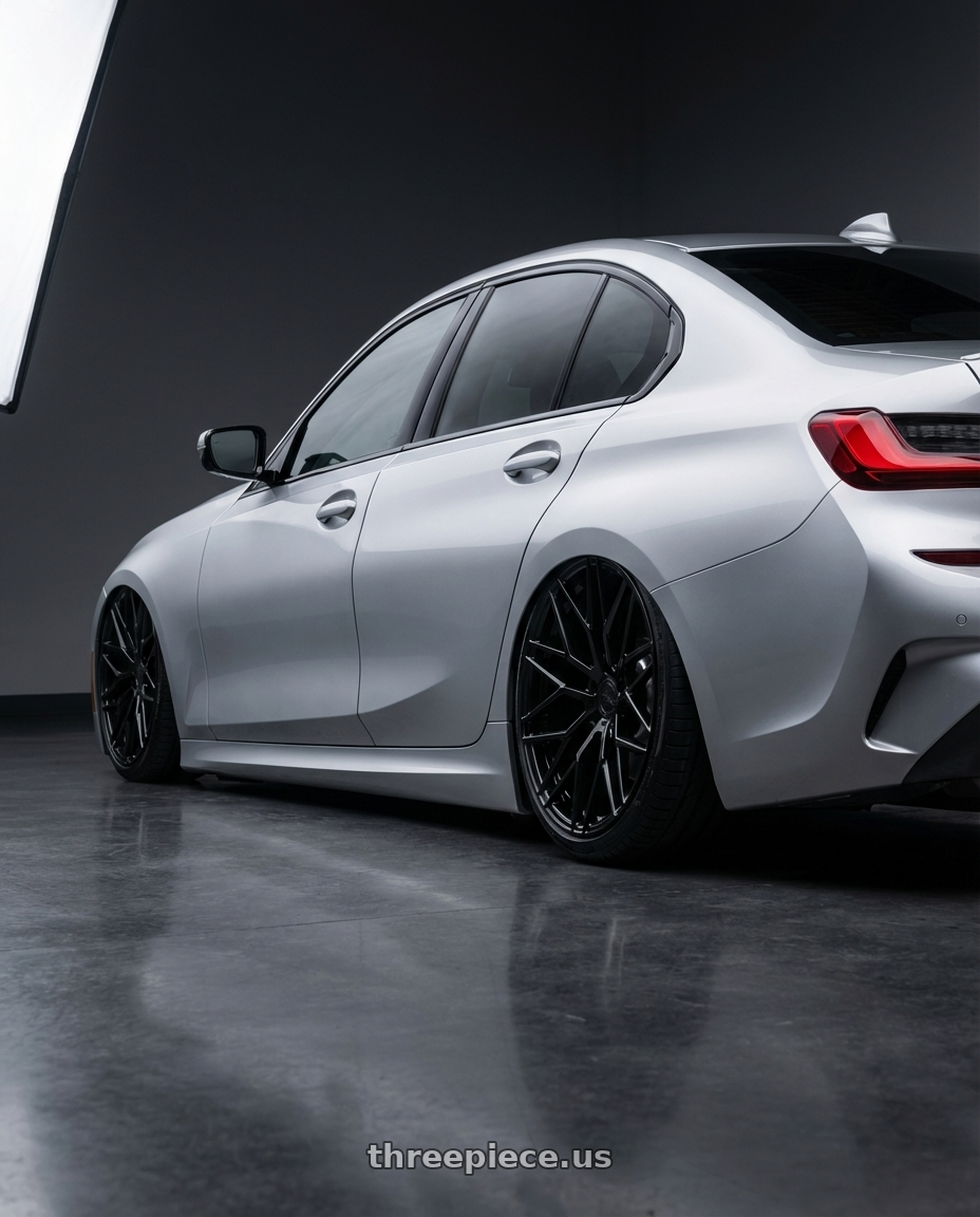 2023 BMW 3 Series G20 with Avant Garde Wheels M520R 5X112 19x8.5 +35 Gloss Black wheels rear three quarter view slight stretch tires