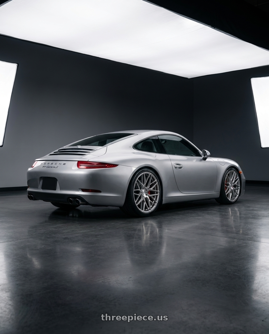 2015 Porsche 911 with Rohana RFX10 5x130 20x9+45 Brushed Titanium wheels rear three quarter view square tires