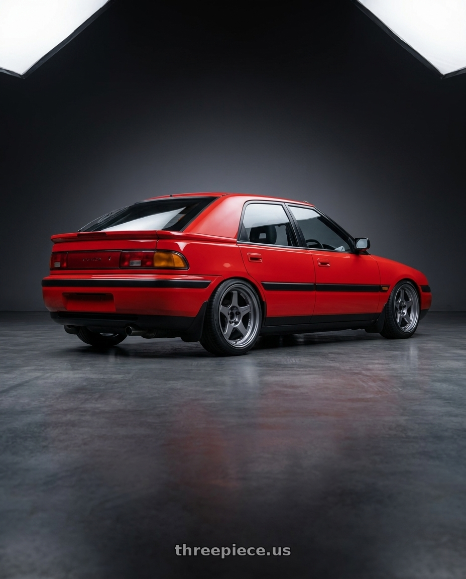 1993 mazda astina with WedsSport Hase Spec II 6x139.7 17x8.5-6 Light Gun Metallic wheels rear three quarter view slight stretch tires