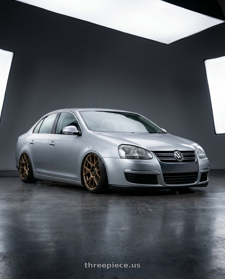 2009 Volkswagen Jetta GLI MK5 with Konig Ampliform 5x112 18x8.5+43 Gloss Bronze wheels