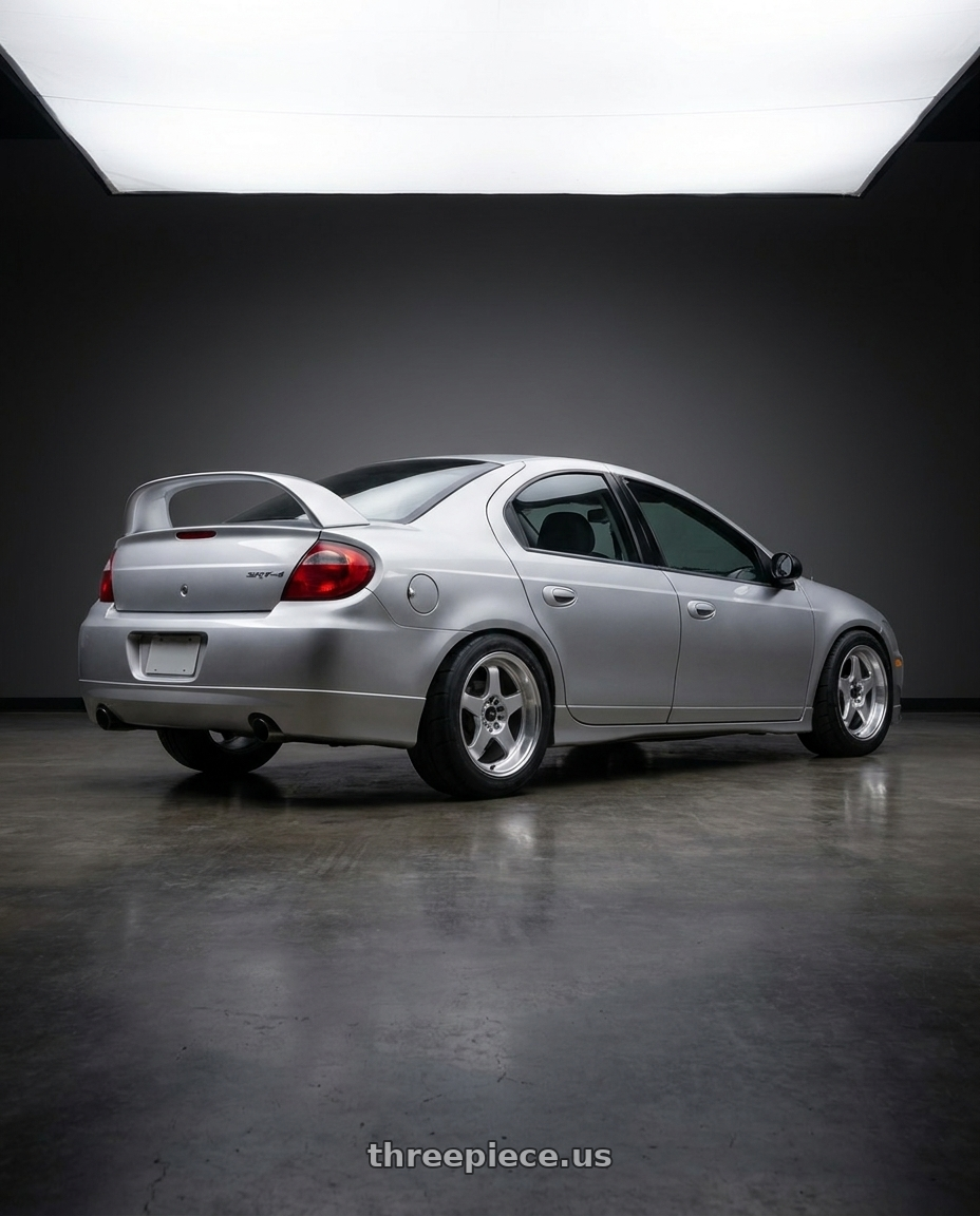 2004 Dodge Srt-4 with Vors SP1 5x100/5x114.3 18x8  +35 Silver Machine Face Lip wheels rear three quarter view meaty tires