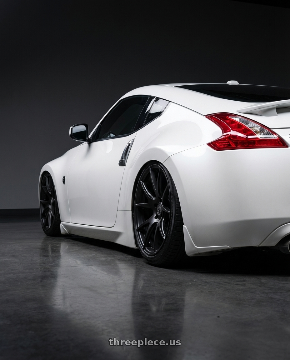 2019 Nissan 370Z with Forgestar CF5V 5x114.3 19x10 +42 Satin Black wheels rear three quarter view slight stretch tires