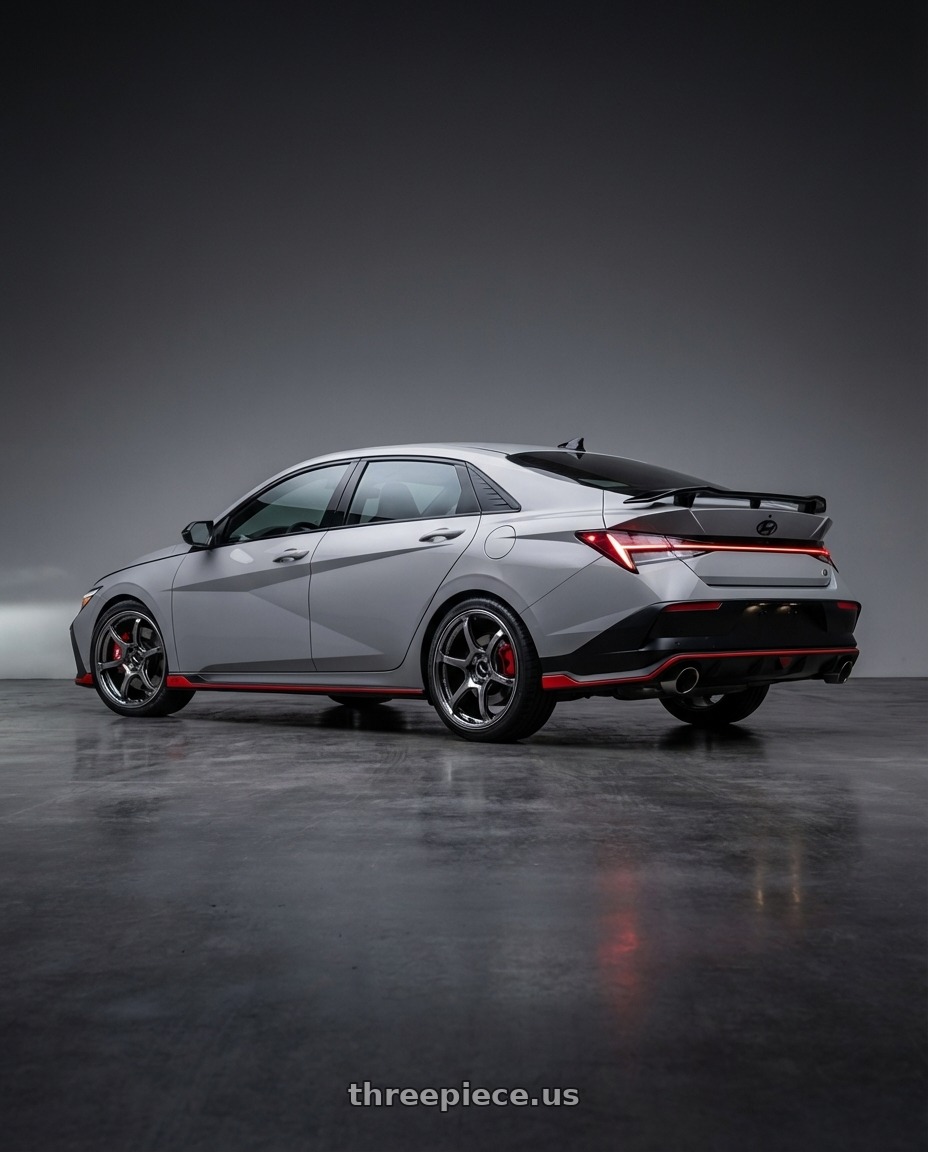 2024 Elantra N Facelift Cyber Grey with Advan Racing RG-4 5x114.3 18x8.5 +44 RACING HYPER BLACK & RING wheels rear three quarter view square tires