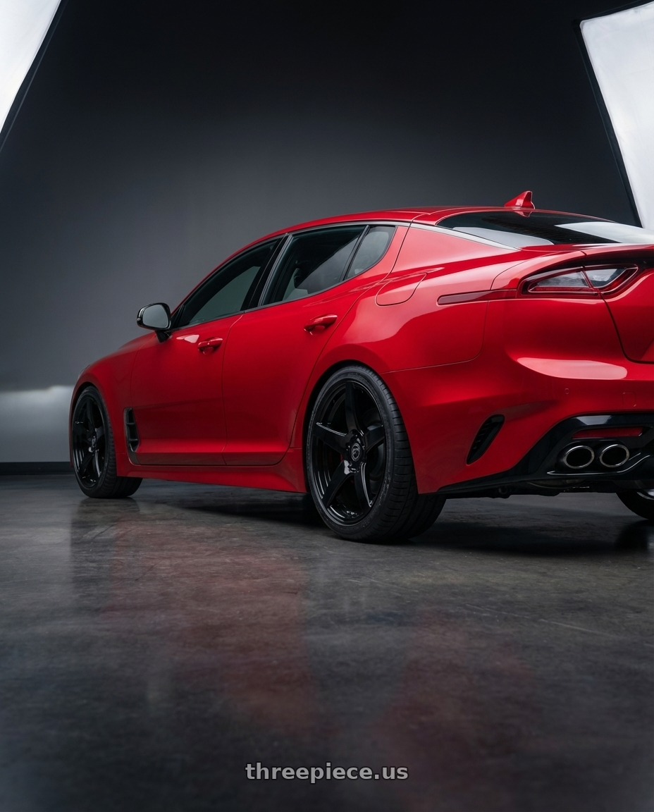 2022 Kia Stinger GT with Forgestar CF5 5x114.3 19x9 +35 Gloss Black wheels rear three quarter view square tires