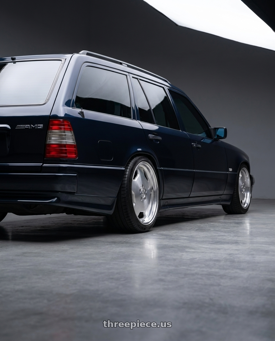 1994 mercedes 300TE midnight blue with Center Line Convo Pro 2.0 5X120.65 15x4 -6 Polished wheels rear three quarter view slight stretch tires