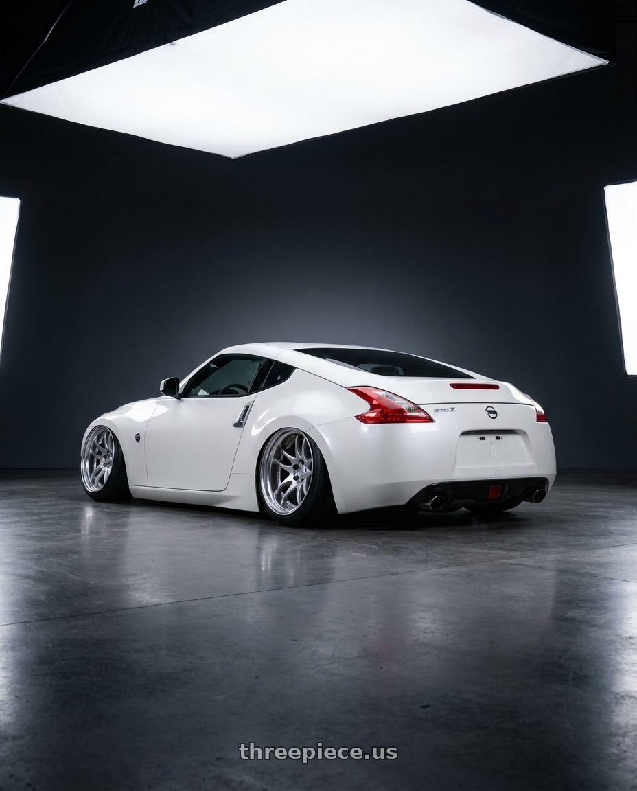2018 Nissan 370z with Work Cr 2P 5x114.3 19x9.5 +18 GT Silver wheels rear three quarter view extreme stretch tires