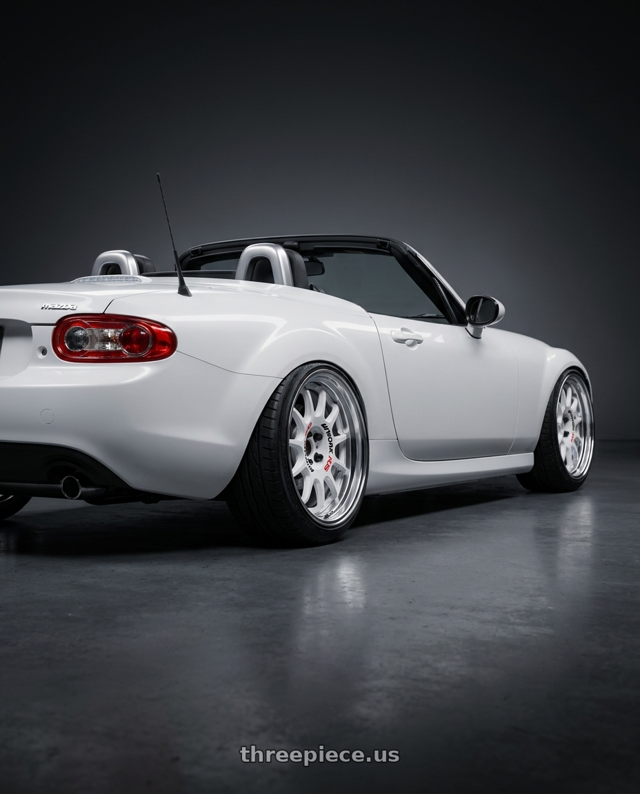 2007 Mazda Miata with Work Emotion Rs11 2p wheels rear three quarter view extreme stretch tires