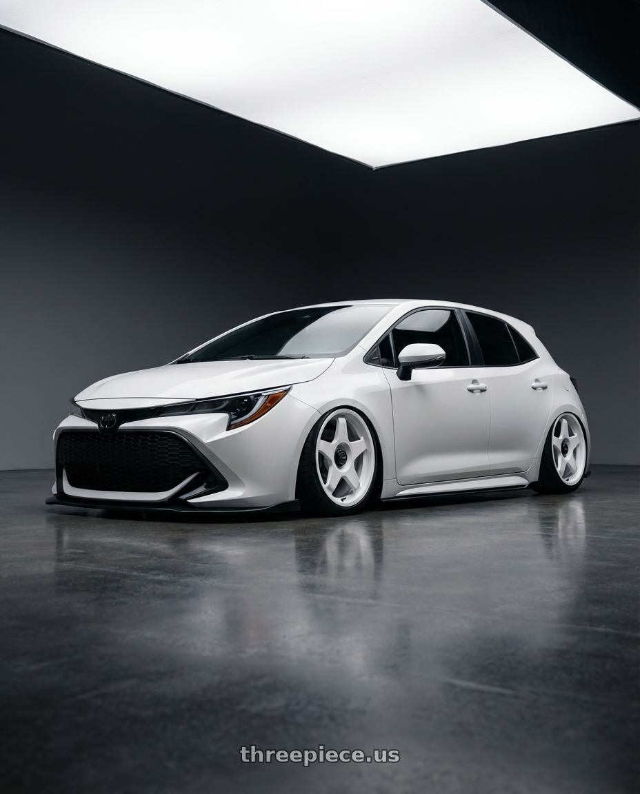 2023 Toyota Corolla Hatchback with fifteen52 CHICANE 5x114.3 / 5x100 18x8.5 +35 RALLY WHITE (GLOSS WHITE) wheels