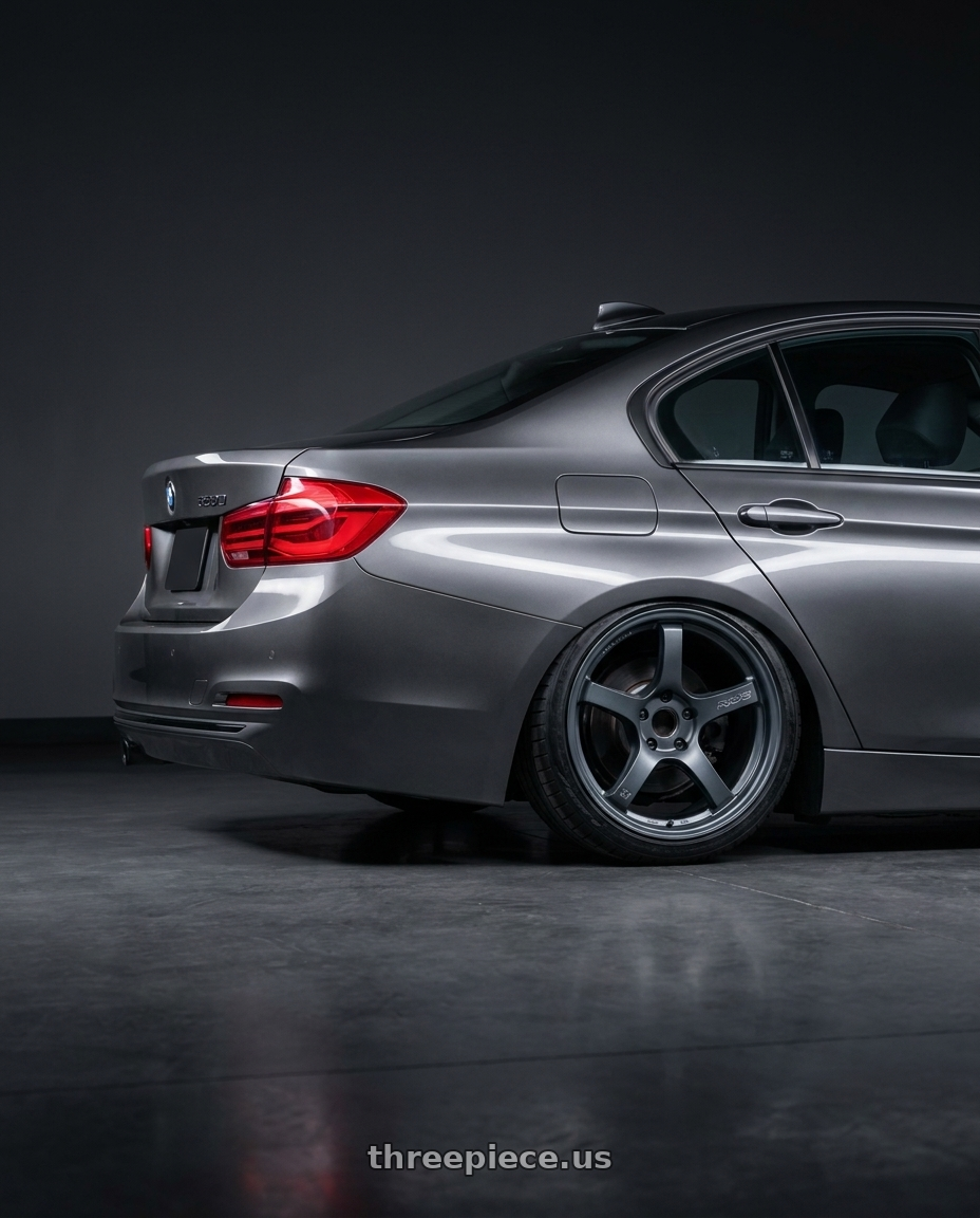 2018 Bmw 320D with Gram Lights 57CR 5x112 19x10.5+22 Gunblue II wheels rear three quarter view slight stretch tires