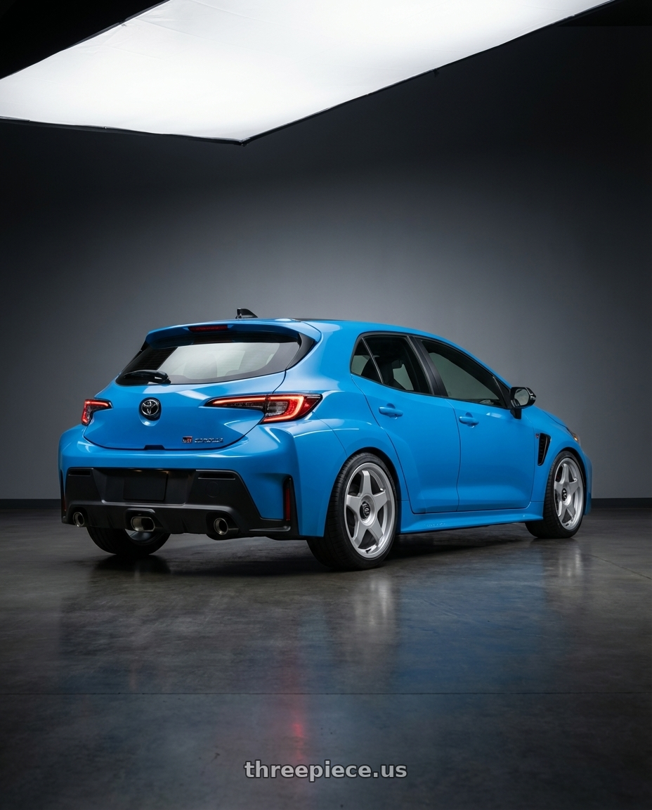 2024 Toyota GR Corolla with fifteen52 CHICANE 5x114.3 / 5x100 18x8.5 +35 SPEED SILVER (GLOSS SILVER) wheels rear three quarter view square tires