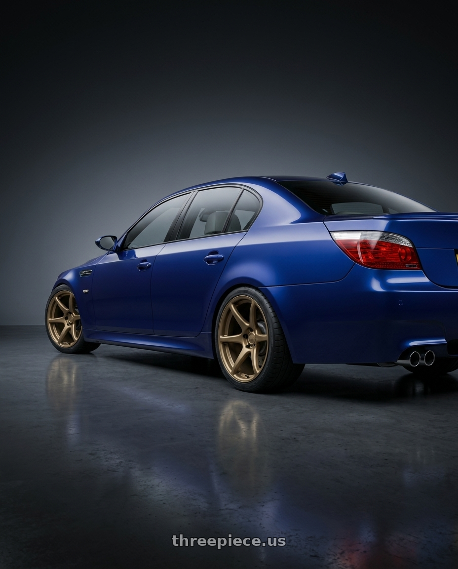 2010 BMW M5 E60 with Kansei K11B Tandem 5X120 19x10.5 22 Bronze wheels rear three quarter view square tires