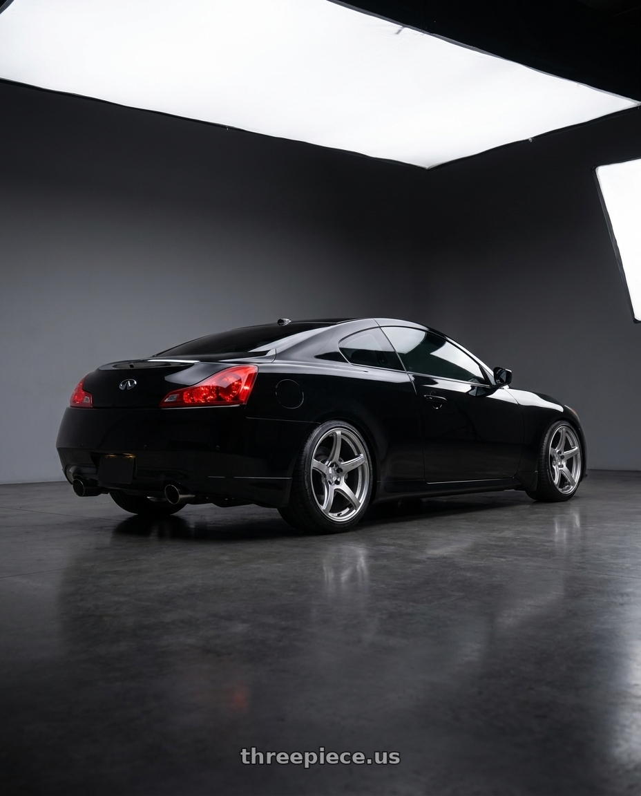 2014 Infiniti q60 with Work Emotion T5r 5x114.3 19x9.5 +25 Glow Silver wheels rear three quarter view slight stretch tires