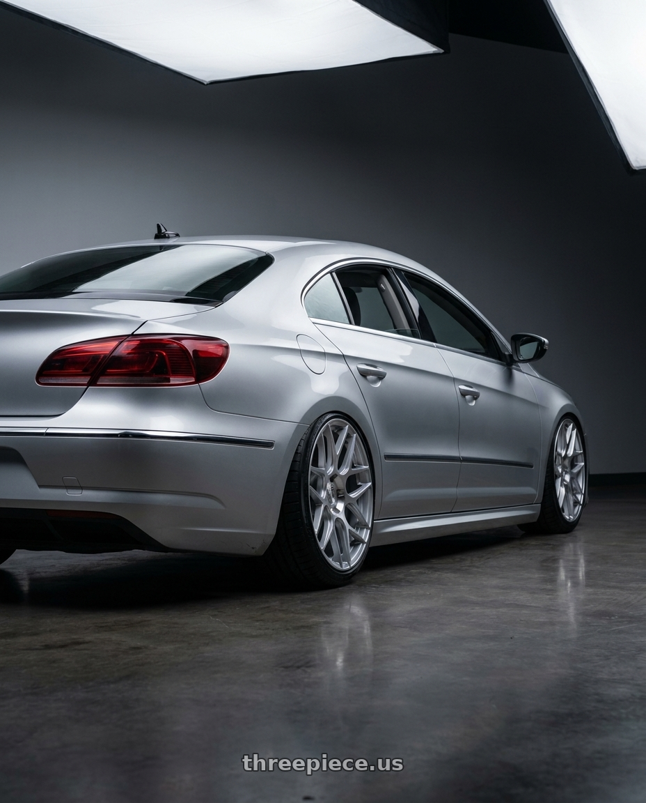 2015 Volkswagen CC with Aodhan AFF2 5x112 19x8.5+35 Gloss Silver Machined Face wheels rear three quarter view slight stretch tires