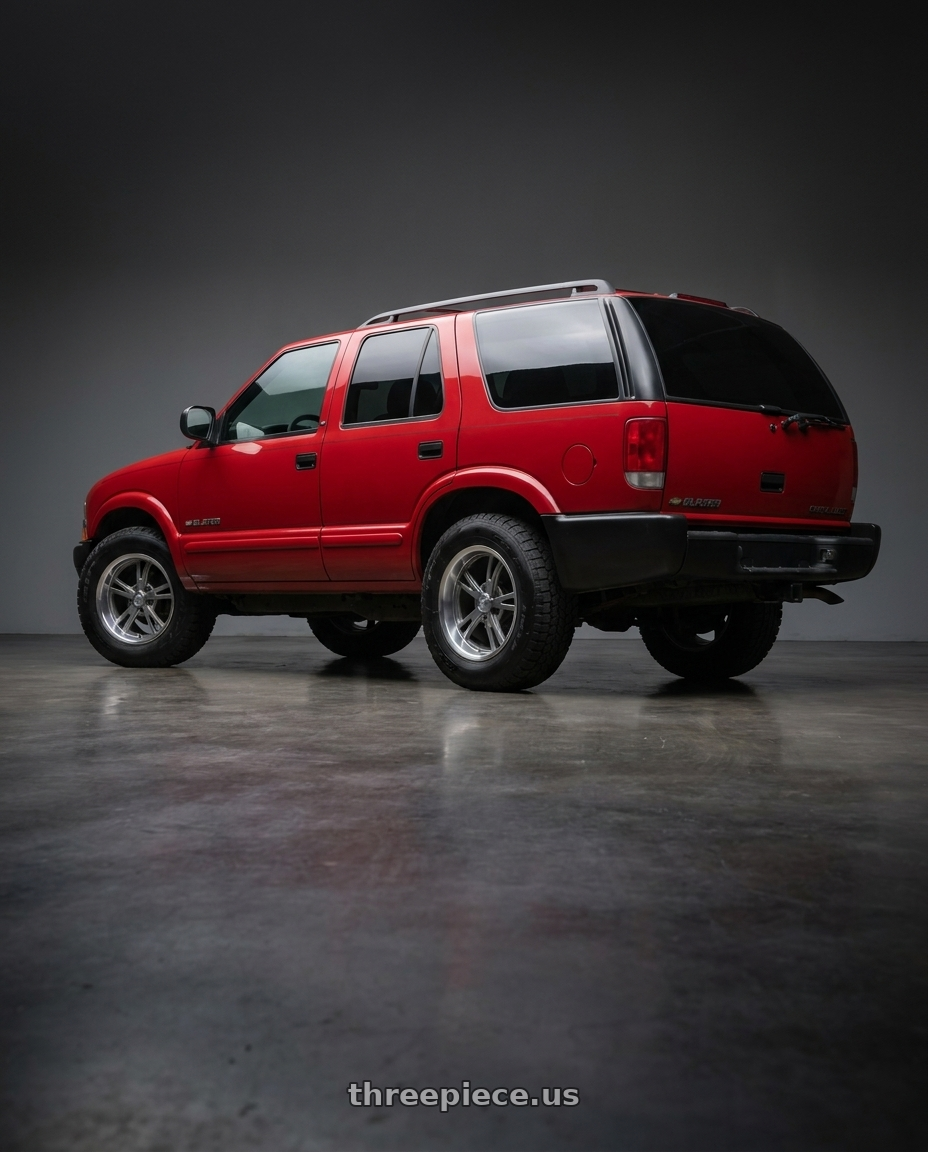 2005 chevy blazer with Ridler Type 606 5x120.65 18x8+0 Grey W/Milled Spokes & Diamond Lip wheels rear three quarter view meaty tires