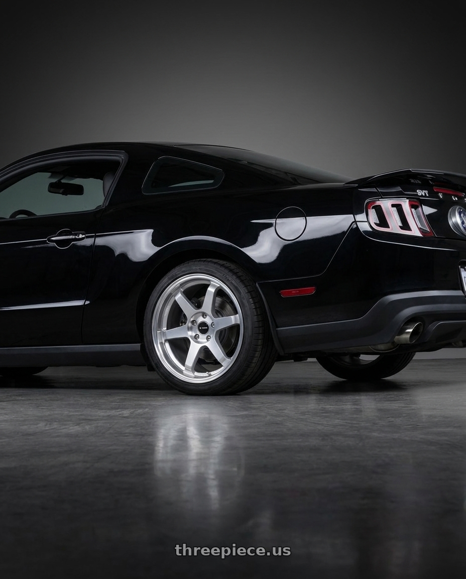 2011 GT500 SVT Performance Package Black with Vors TR37 5x114.3 19x9.5  +35 Silver Machine Face Lip wheels rear three quarter view square tires