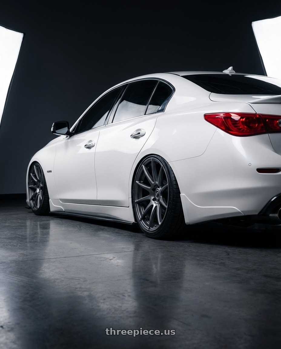 2020 Infiniti Q50 with Forgestar CF10 5x114.3 20x9.5 +29 Gloss Anthracite wheels rear three quarter view slight stretch tires