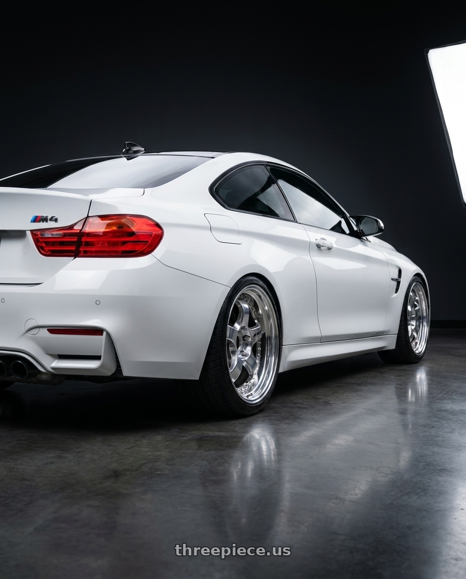2015 BMW M4 with Work Meister S1 3P wheels rear three quarter view square tires