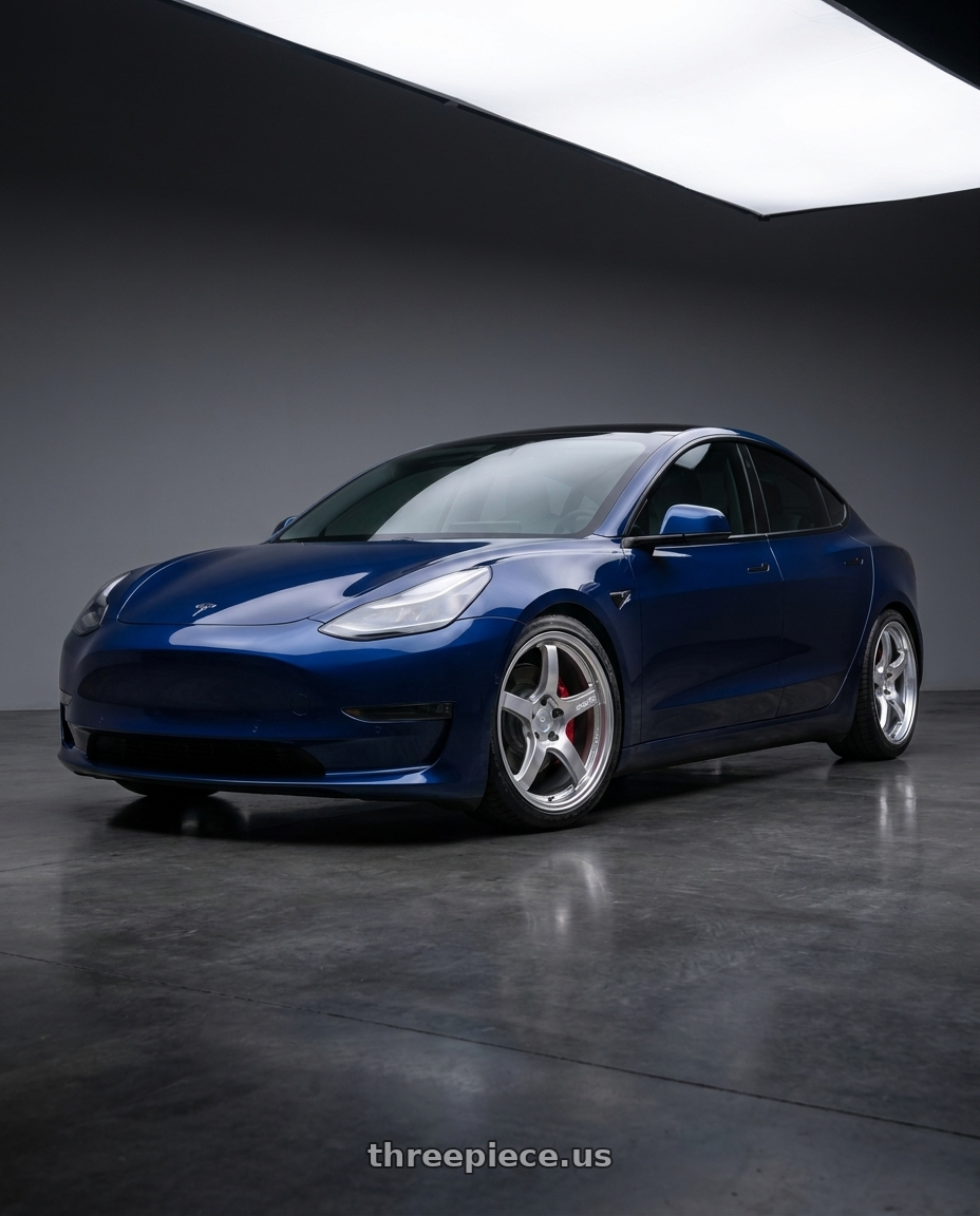 2023 Tesla Model 3 Performance with Gram Lights 57CR 5x114.3 19x9.5 +25 GRACE SILVER wheels front three quarter view lowered stance