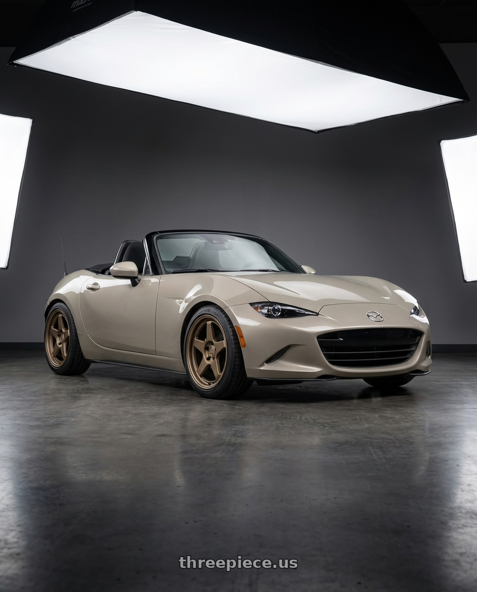 2021 Mazda MX-5 Miata ND with Kansei K12B KNP 5x114.3 17x9 35 Bronze wheels front three quarter view lowered stance