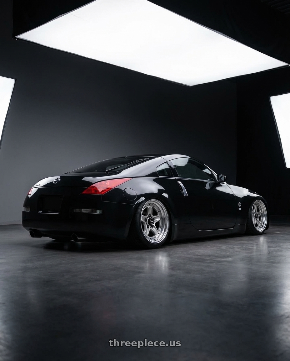 2009 nissan 350z with Work Equip 40 4x100 15x8.5 +41 a disk Brut Silver wheels rear three quarter view slight stretch tires