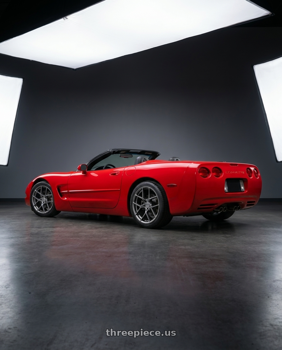 2000 Chevy corvette with American Racing AR924 CROSSFIRE 5X120.65 18X8.5 +50 GRAPHITE wheels rear three quarter view square tires