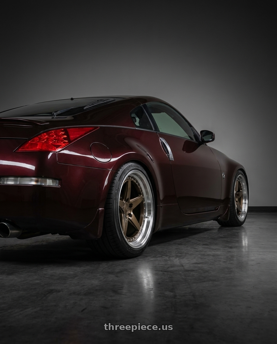 2003 Nissan 350Z with Aodhan DS05 5x114.3 18x10.5+15 Bronze w/Machined Lip wheels rear three quarter view square tires