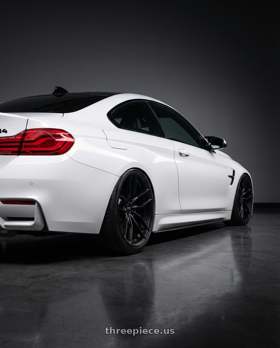 2018 BMW M4 F82 with Niche 1PC M203 VOSSO 5X120 19X9.5 +40 MATTE BLACK wheels rear three quarter view slight stretch tires