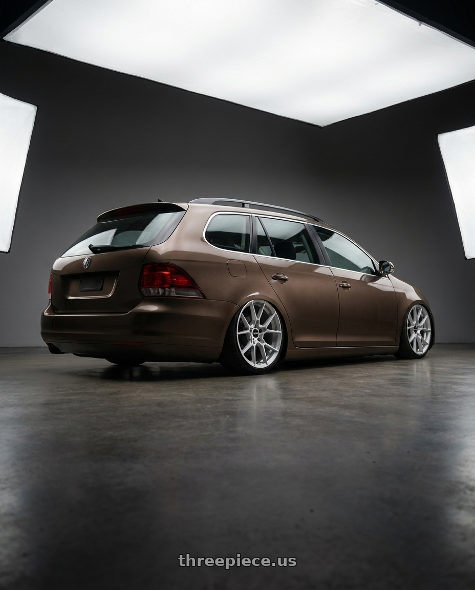 2011 Volkswagen golf variant brown highline with Rotiform RC199 KPR 5X112 19x8.5 +45 SILVER wheels rear three quarter view slight stretch tires
