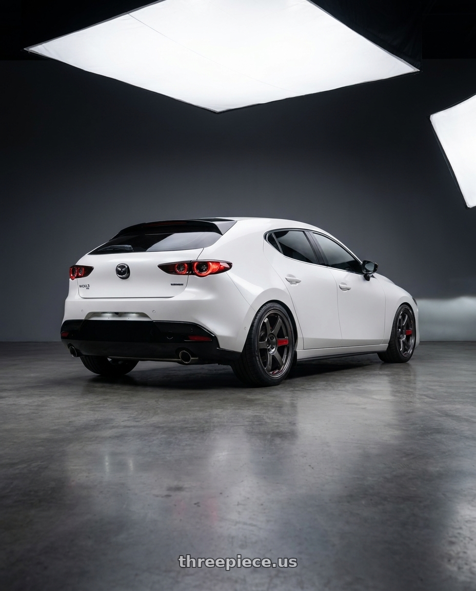 2024 Mazda3 Fastback  with Volk Racing TE37 Saga SL 5x114.3 18x8.5+45 Pressed Graphite wheels rear three quarter view square tires