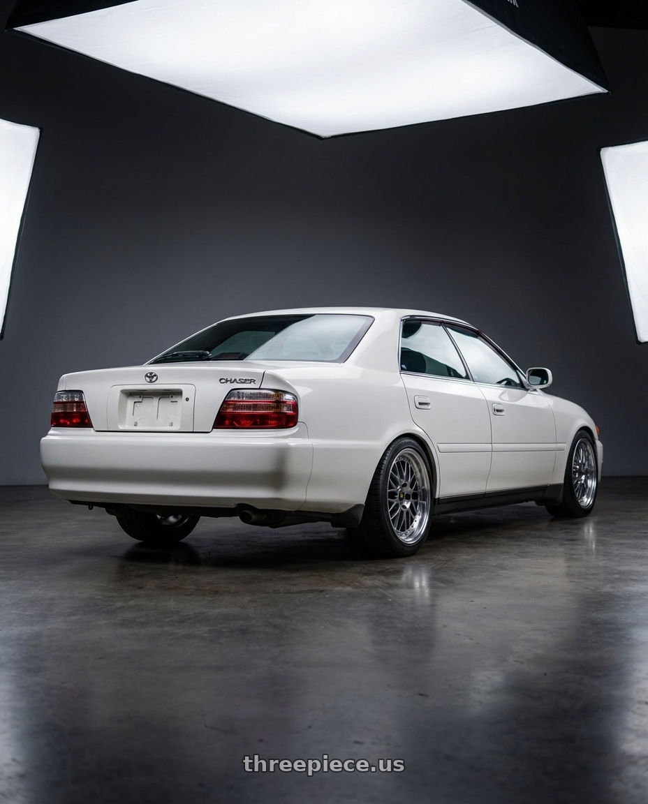 1999 Toyota Chaser Tourer GP with Work Vs-Xv 5x100 18x7+2 A Disk Brilliant Silver Black wheels rear three quarter view square tires