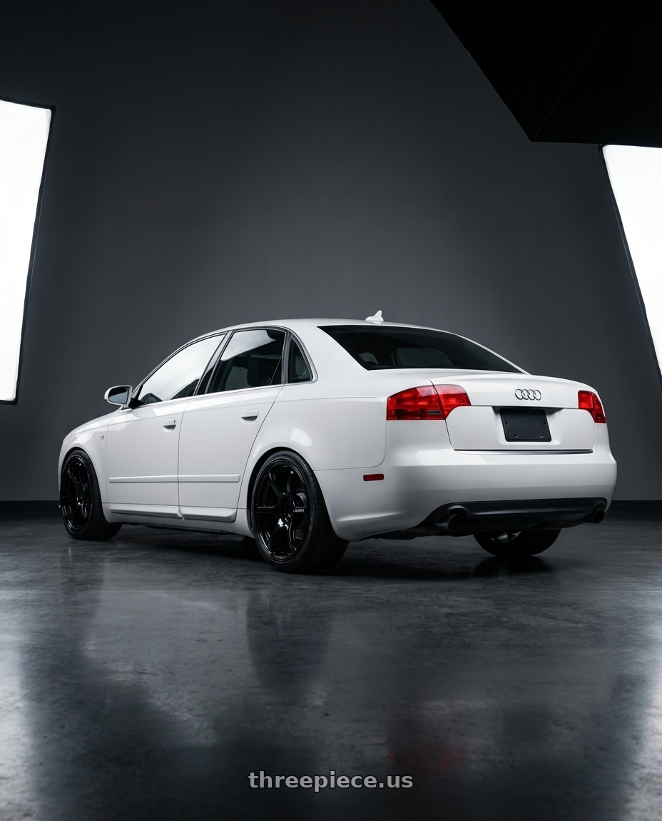 2010 Audi A4 B7 with Advan RGIII 5x112 18x8+42 Gloss Black wheels rear three quarter view square tires