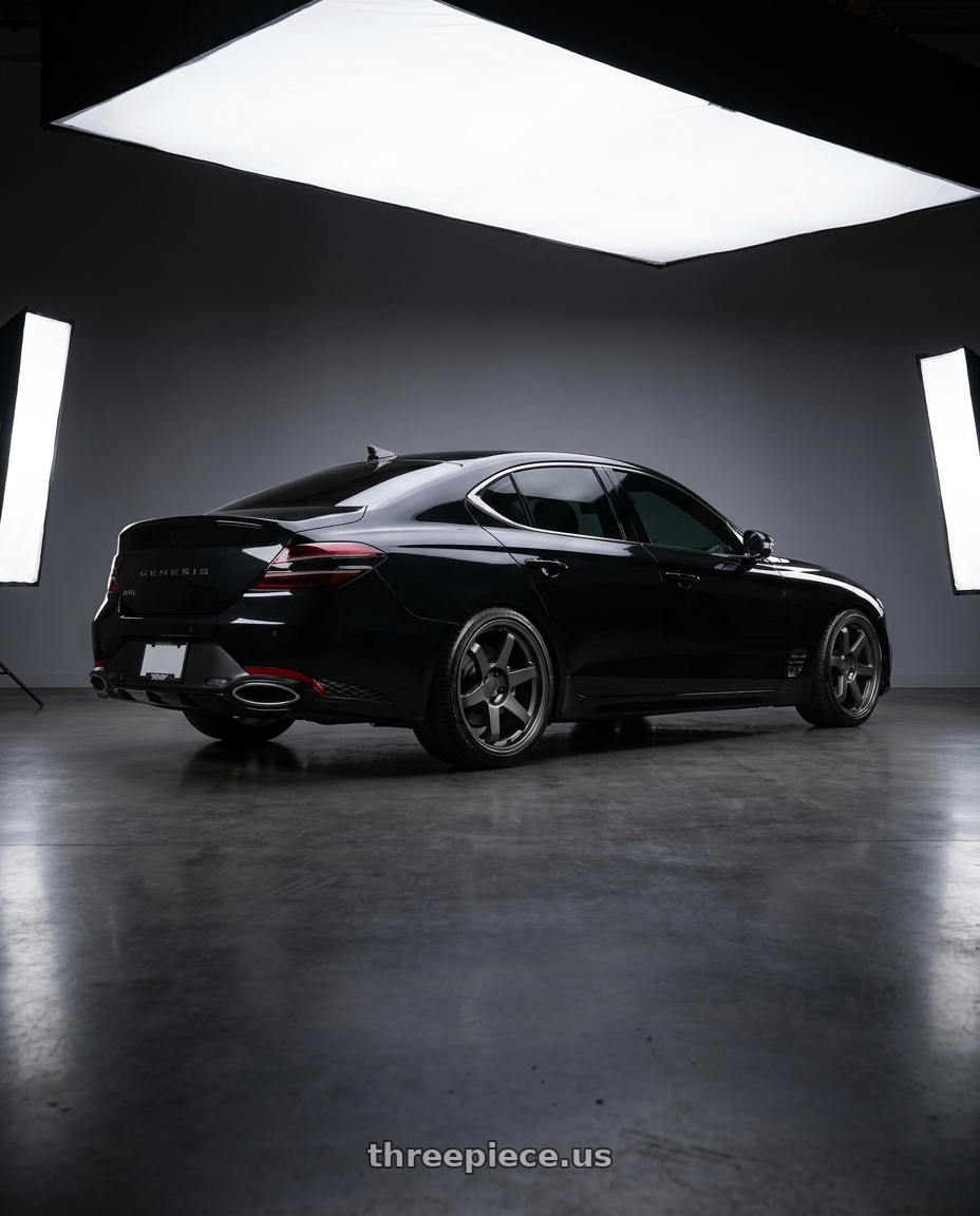 2023 Genesis G70 with 9six9 SIX-1 5x114.3 19X8.5 +35 Carbon Gray wheels rear three quarter view slight stretch tires