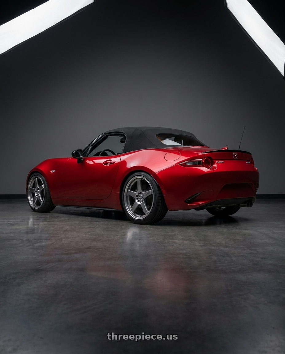 2016 Mazda Miata with Enkei EV5 4x100/114.3 17x7+38 Hyper Black wheels rear three quarter view square tires