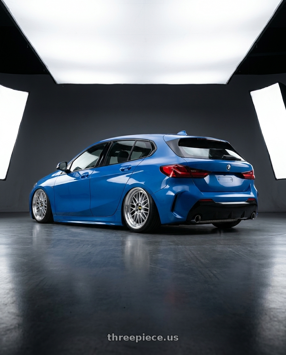 2021 Bmw 1 series with BBS LM 5x112 19x9.0+42 Diamond Silver wheels rear three quarter view slight stretch tires
