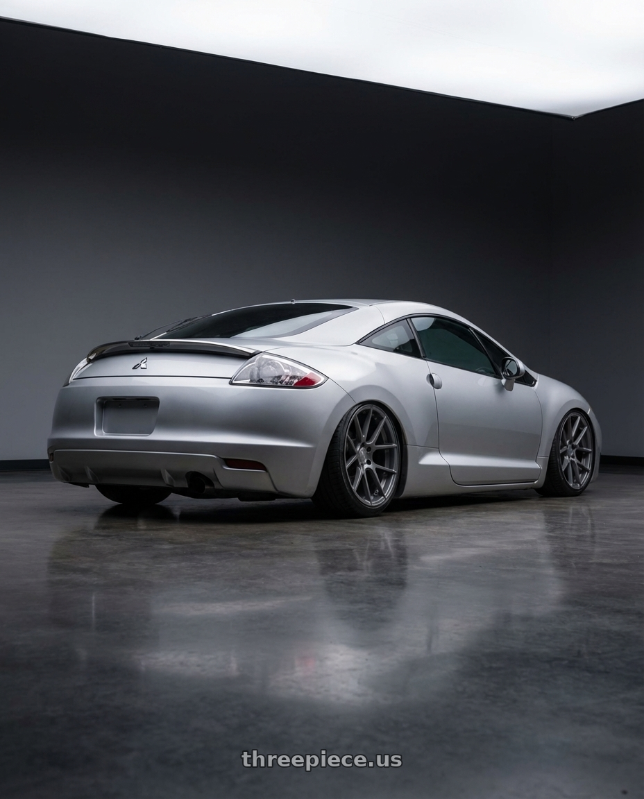 2010 Mitsubishi Eclipse with Avant Garde Wheels M510 5X114.3 19x9.5 +40 Dolphin Grey wheels rear three quarter view slight stretch tires