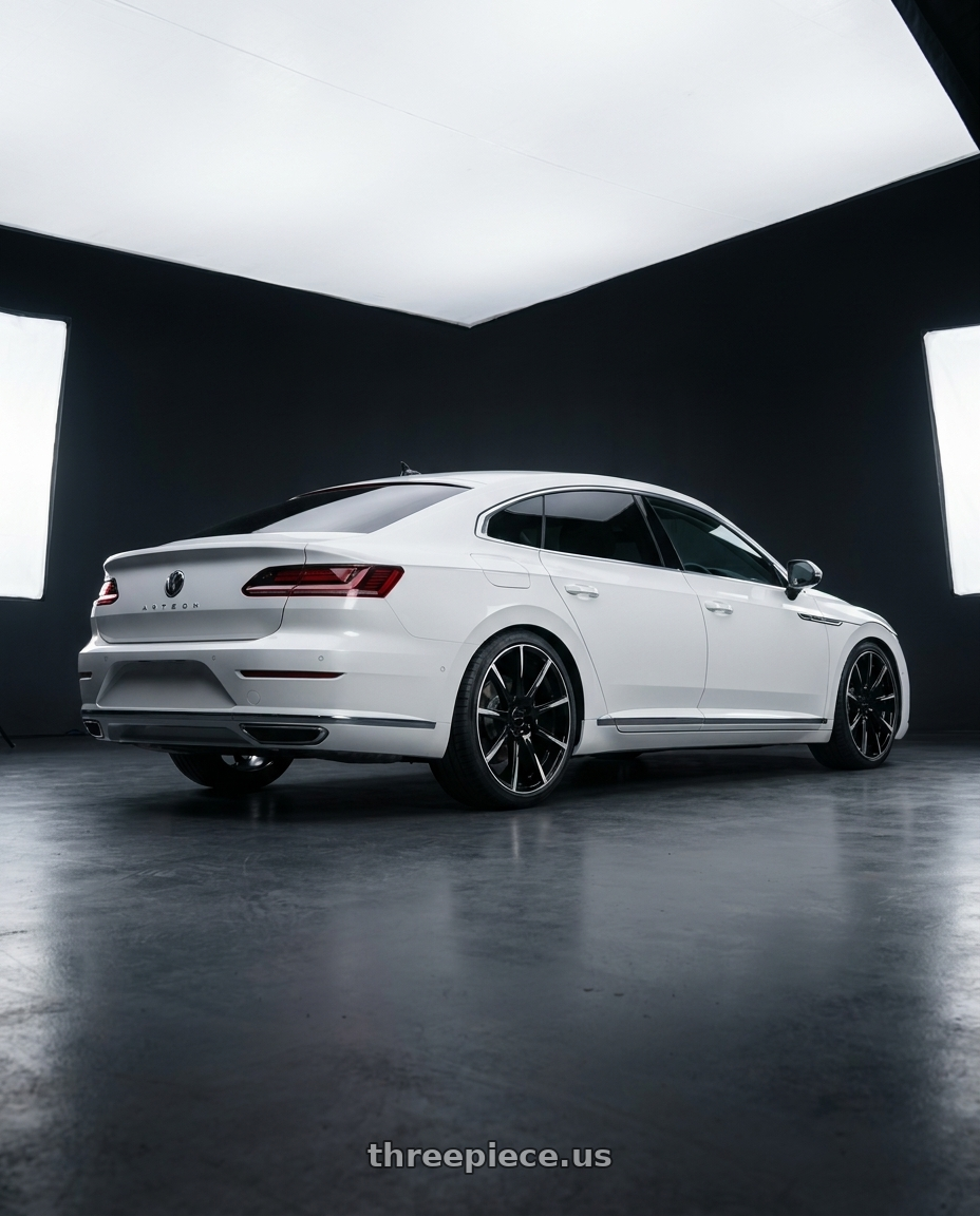 e.g. 2024 arteon white with RAVETTI M9 5X120 20x8.5 +35 BLACK MACHINED wheels rear three quarter view square tires