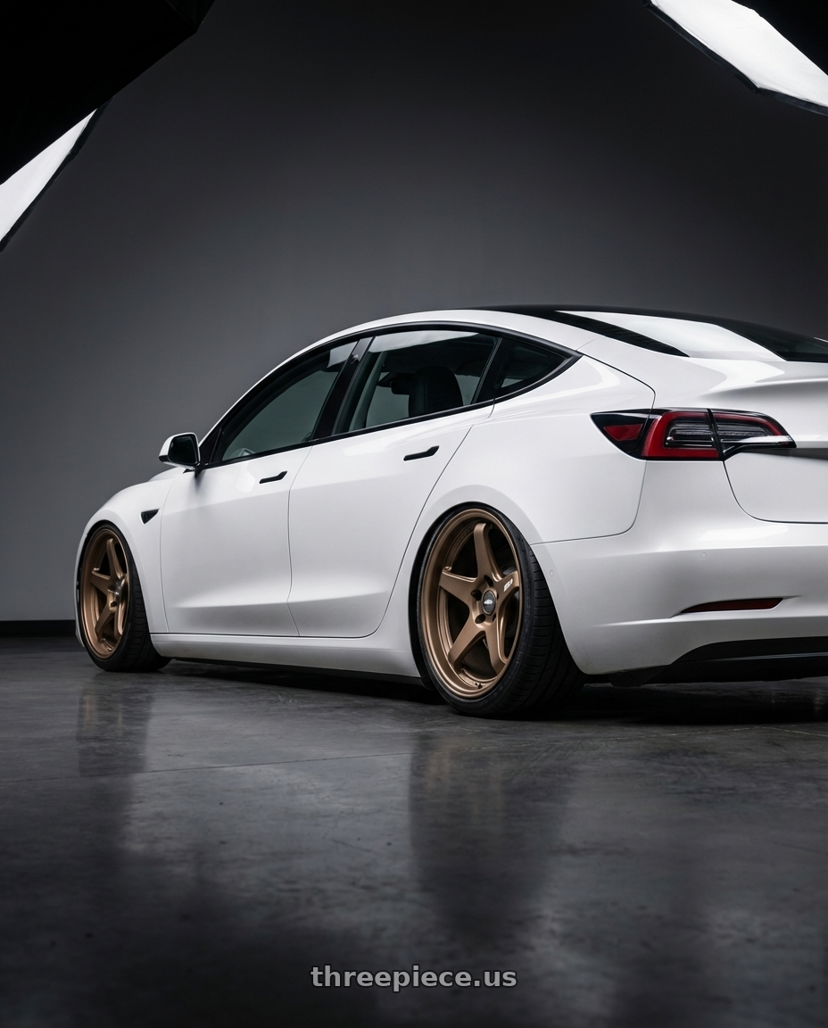 2023 Tesla Model 3 with ESR Wheels APEX SERIES AP5 5x114.3 19x9.5 +22 Matte Bronze wheels rear three quarter view slight stretch tires
