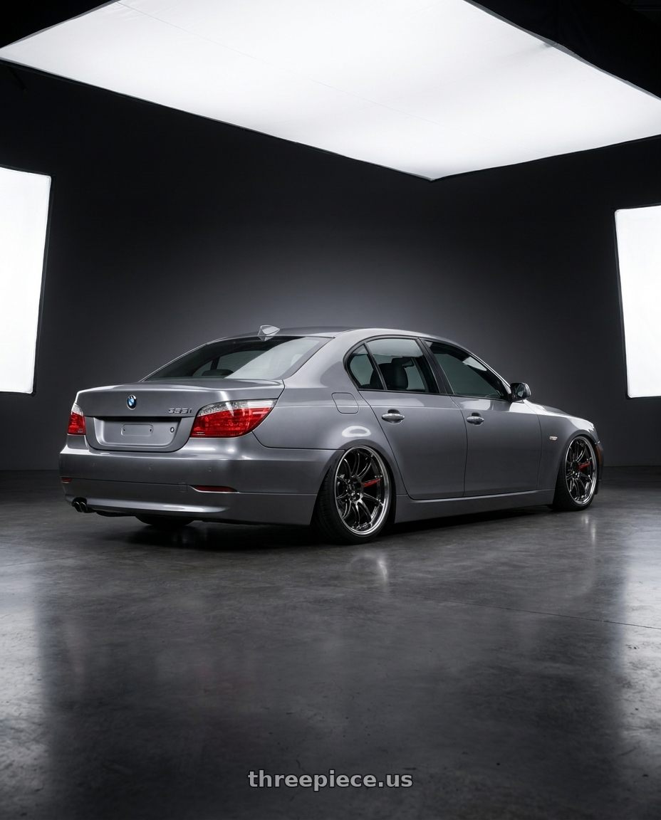 2009 E60 535i space gray metallic with Work Zr10 2P 5x120 18x10.0 +38 Glim Black wheels rear three quarter view slight stretch tires