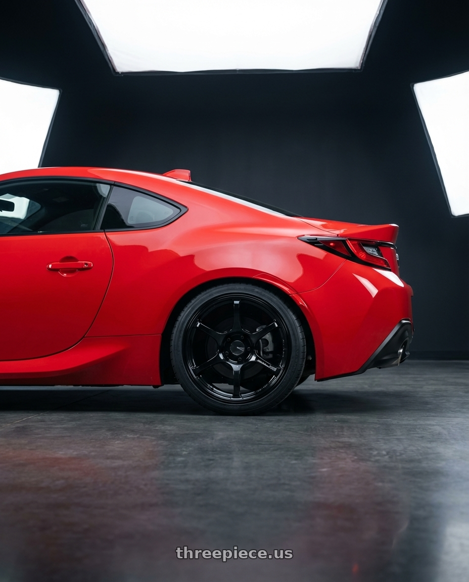 2024 Toyota GR86 with Advan RGIII 5x114.3 18x8.5+31 Gloss Black wheels rear three quarter view square tires