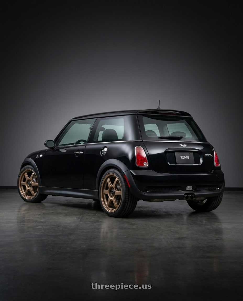 2003 mini cooper s  with Konig Hexaform 4x100 17x8+45 Matte Bronze wheels rear three quarter view square tires
