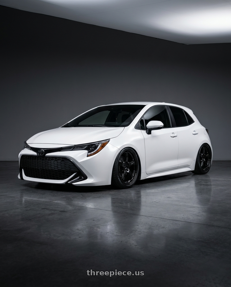 2023 Toyota Corolla Hatchback with Gram Lights 57CR 5x114.3 18x9.5+22 Glossy Black wheels