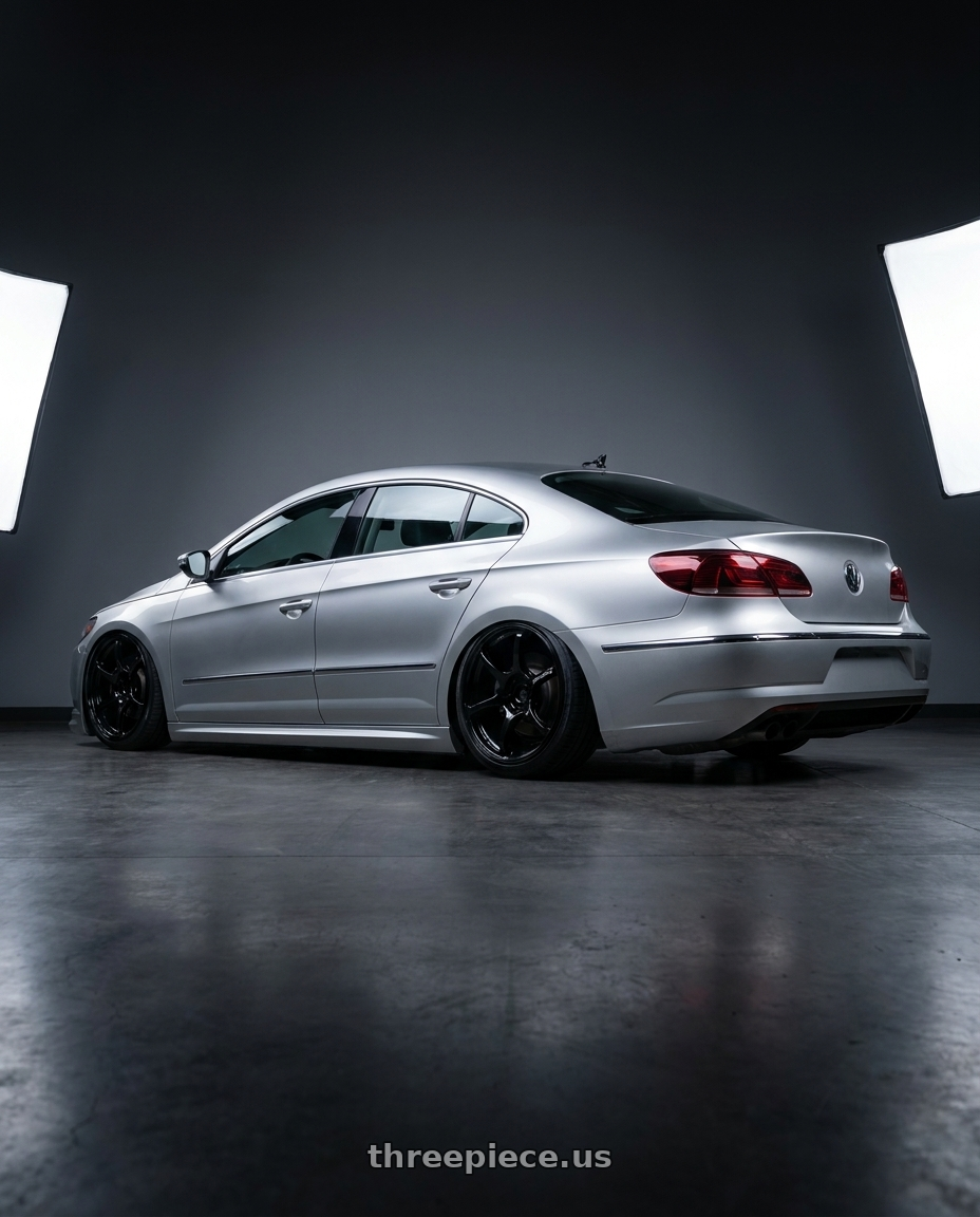 2015 Volkswagen CC with Advan RGIII 5x112 19x8.5+45 Gloss Black wheels rear three quarter view slight stretch tires