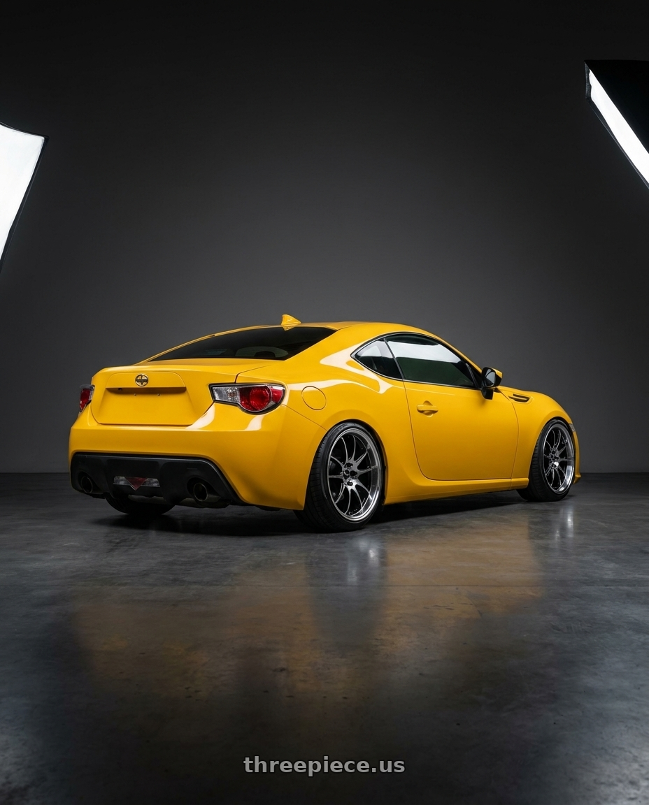 2015 scion frs with Spec-1 SP-56 5x100/5x114.3 18x8 +38 Gloss Black & Machined wheels rear three quarter view slight stretch tires