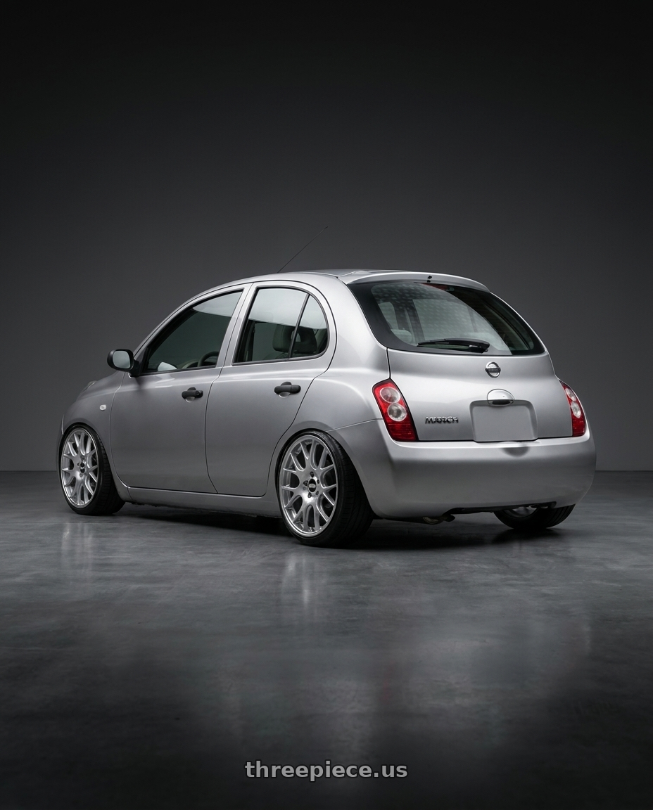 2007 Nissan march with BBS CH-R 5x130 19x8.5 +51 Brilliant Silver Polished Rim Protector wheels rear three quarter view slight stretch tires