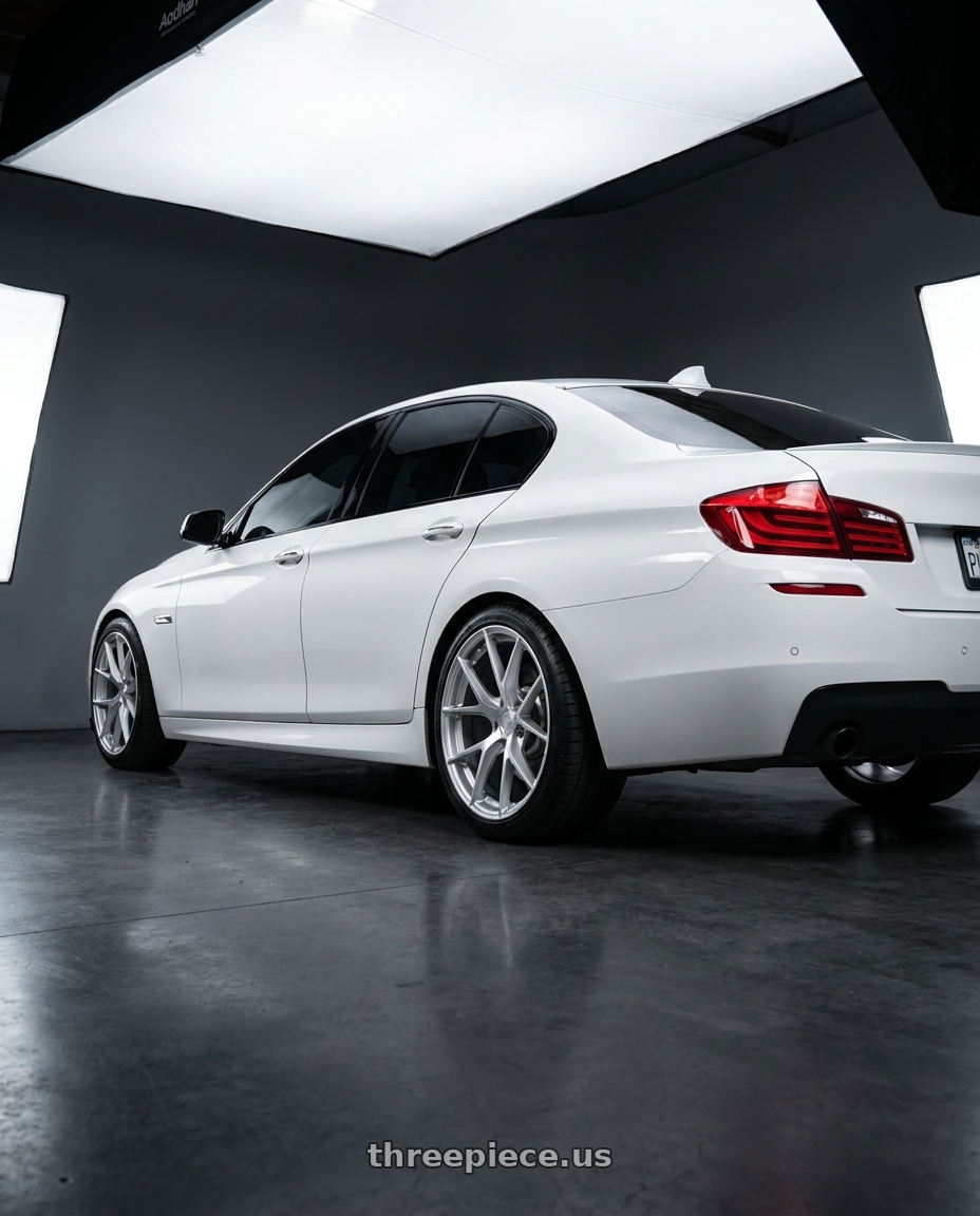 2014 BMW 535i xDrive with Aodhan AFF7 5x120 20x9+30 Gloss Silver Machined Face wheels rear three quarter view square tires