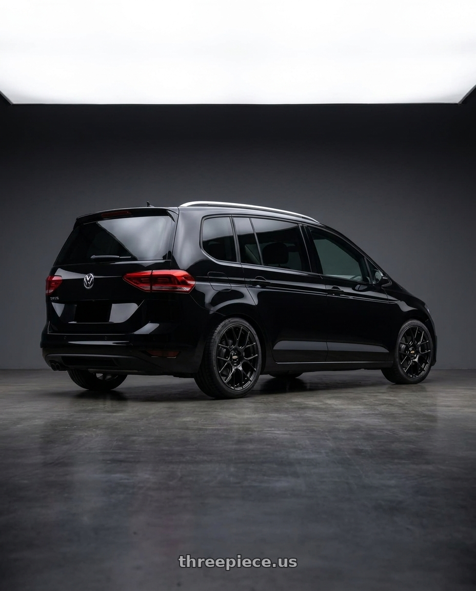 2025 VW TOURAN BLACK with BBS RE-V7 5x112 18x8.5 +42 Gloss Black wheels rear three quarter view square tires