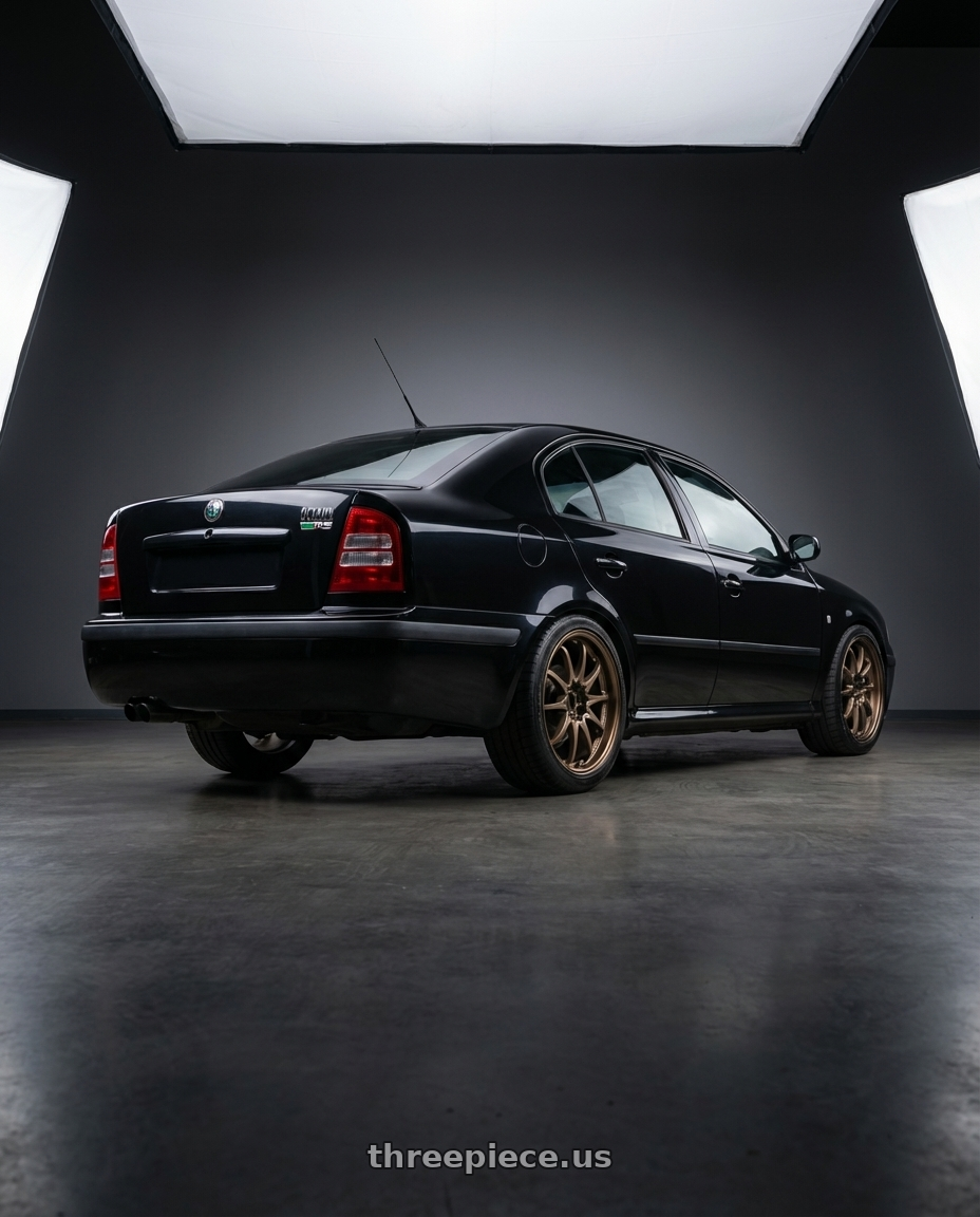2002 Skoda Octavia RS with Volk Racing CE28N 5x114.3 18x8.5 +30 BRONZE wheels rear three quarter view square tires