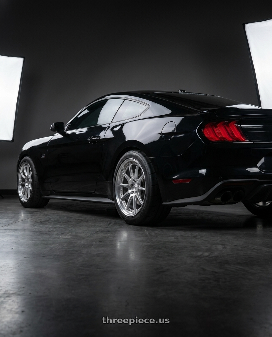2021 Mustang gt fastback with Aodhan DS07 5x114.3 19x9.5+22 Silver w/Machined Face wheels rear three quarter view meaty tires